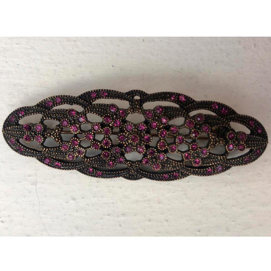 Broche flores y piedras