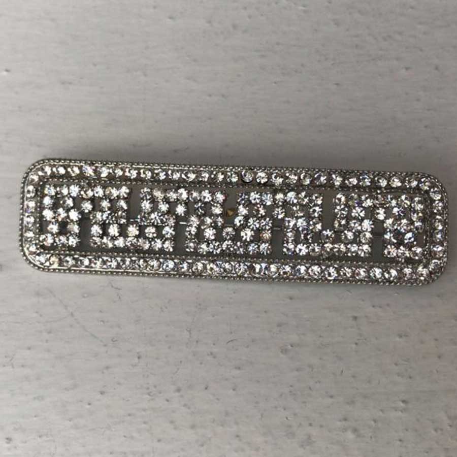 Broche pedrería grecas