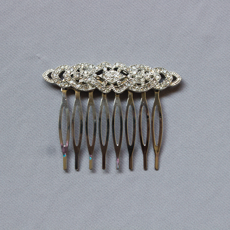 Peineta metal plateado pedrería Flor al centro