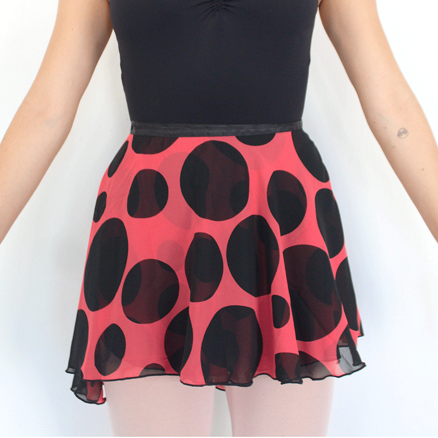 Falda Shiffón adulta coral lunares negros
