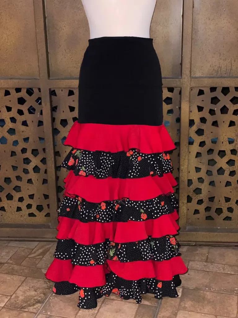Falda gitana negra con olan rojo, lunares y flor chica