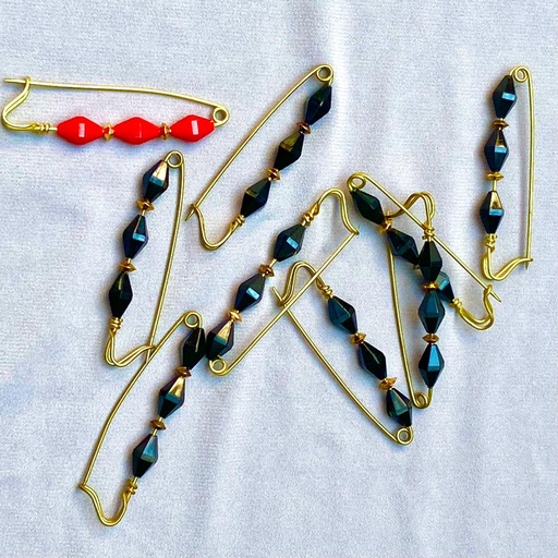 Broche segurito con pedrería