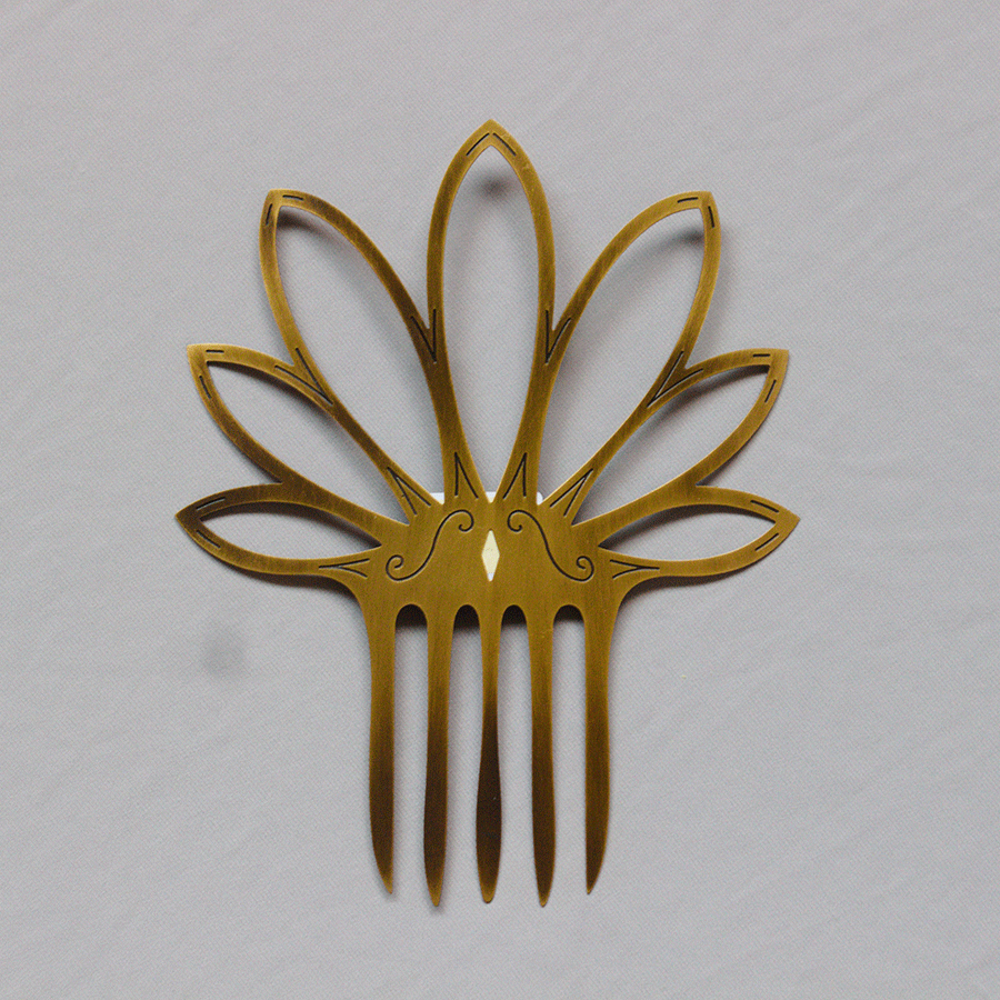 Peineta Flor de loto metal